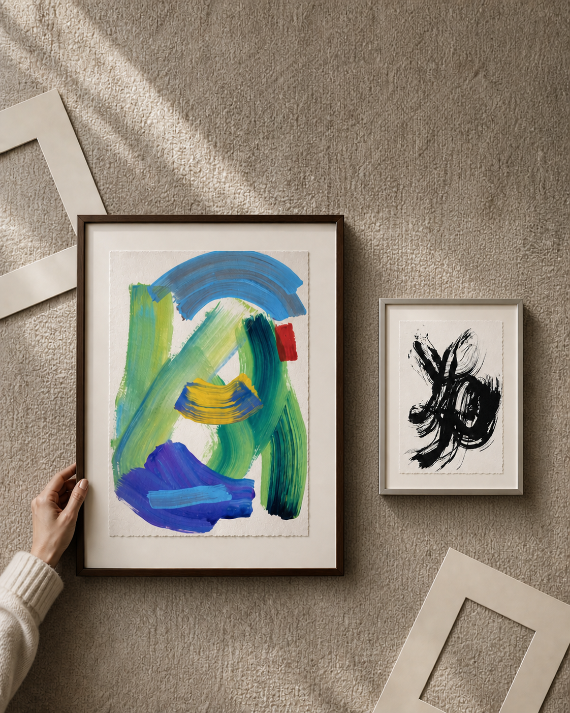 Flat lay of collected original artworks on paper