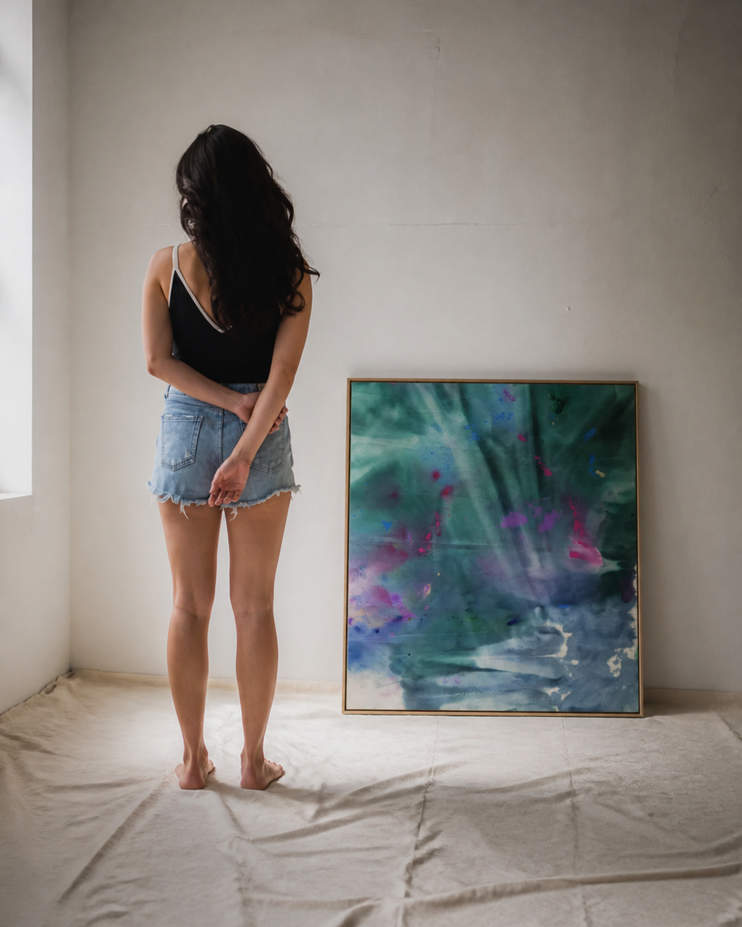 Escape with You artwork displayed behind a standing collector